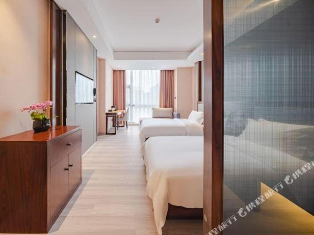 Дэян: Totem Impress Hotel