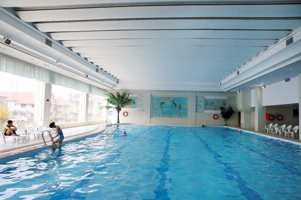Яньтай: Yantai New Era Hotel