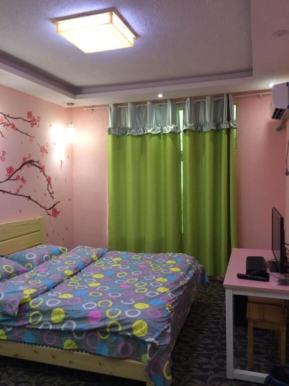 Фуян: Momo Hotel
