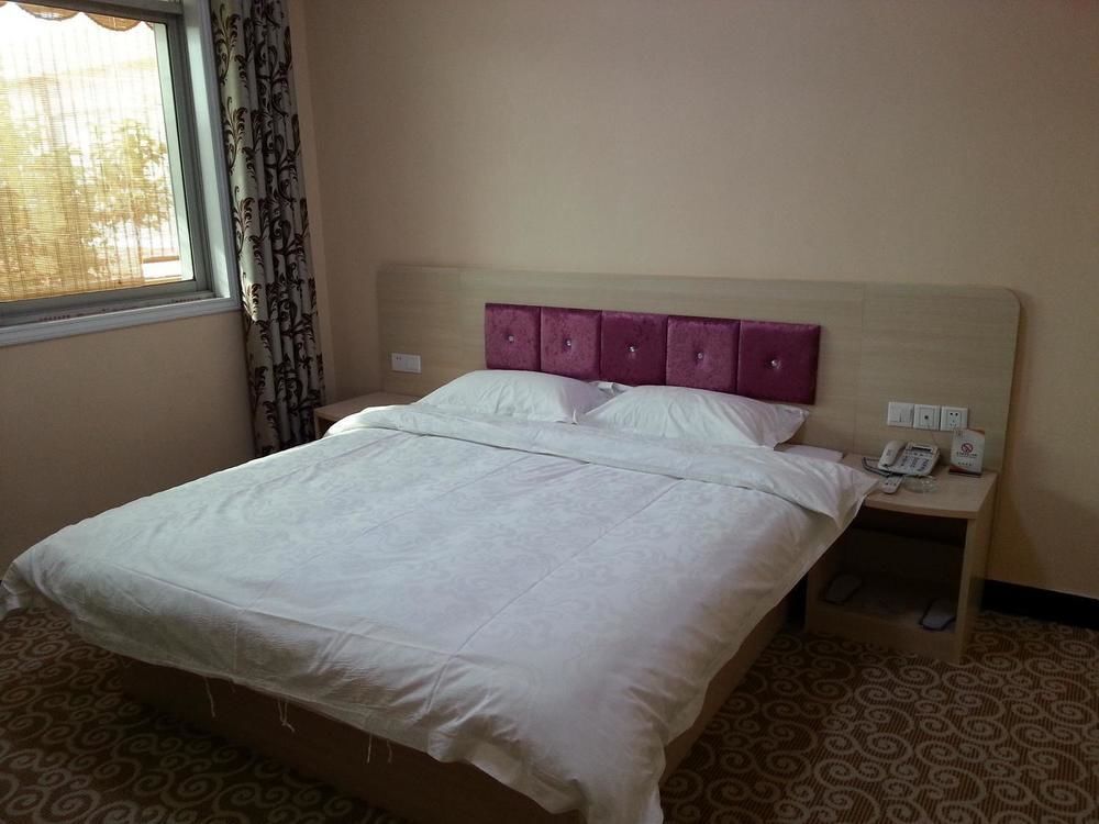 Лоян: Qi Sheng Inns Hotels