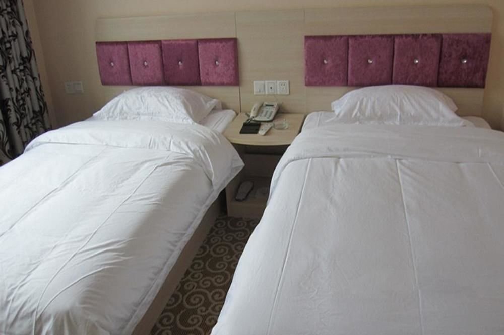 Лоян: Qi Sheng Inns Hotels