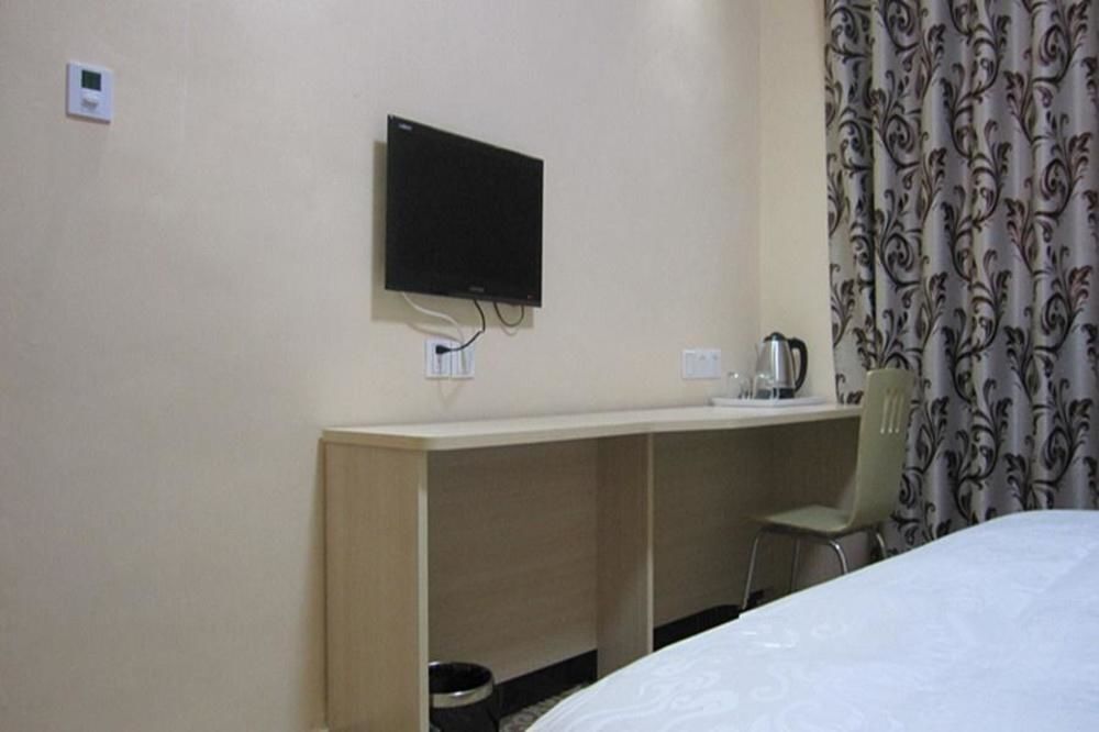 Лоян: Qi Sheng Inns Hotels
