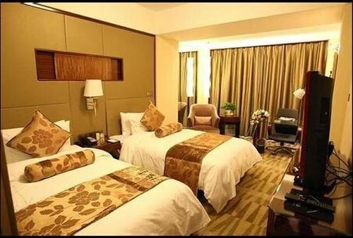 Лиаоченг: Oushang Business Hotel