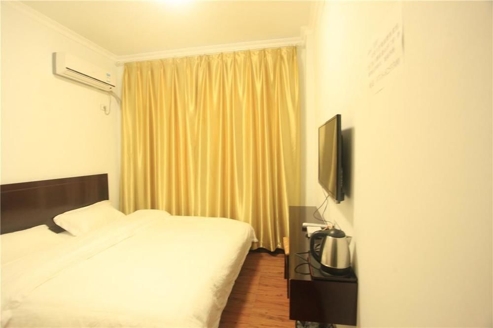 Эньши: Nan'an Business Hotel