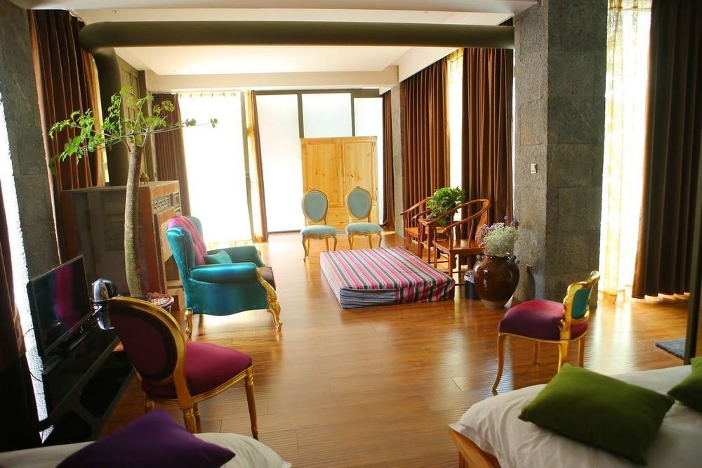 Дали: Qinglu Shangzhai Art Hotel