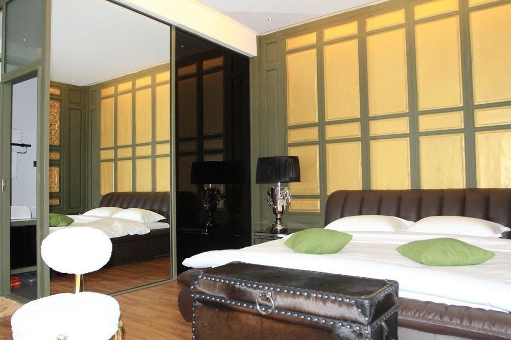 Дали: Qinglu Shangzhai Art Hotel