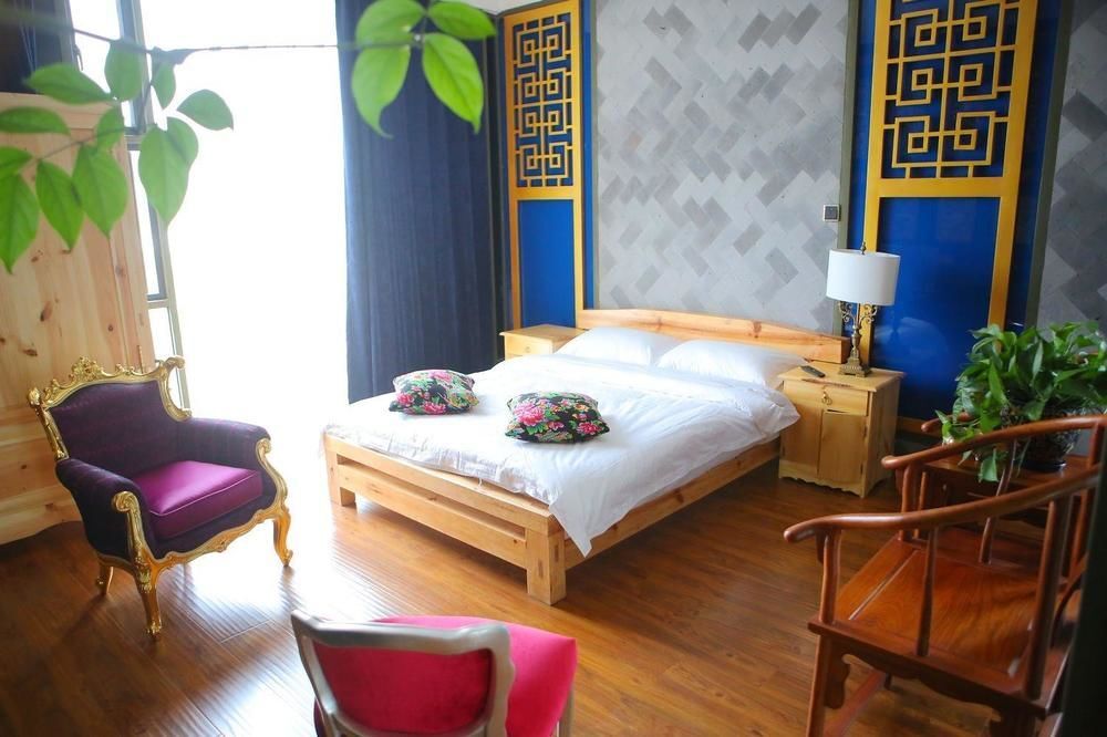 Дали: Qinglu Shangzhai Art Hotel