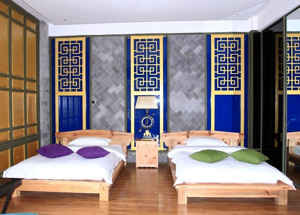 Дали: Qinglu Shangzhai Art Hotel