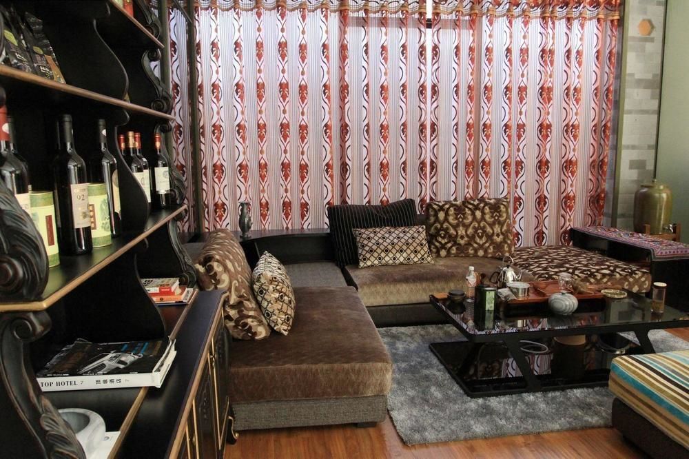 Дали: Qinglu Shangzhai Art Hotel