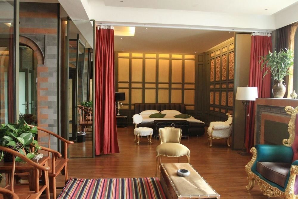 Дали: Qinglu Shangzhai Art Hotel