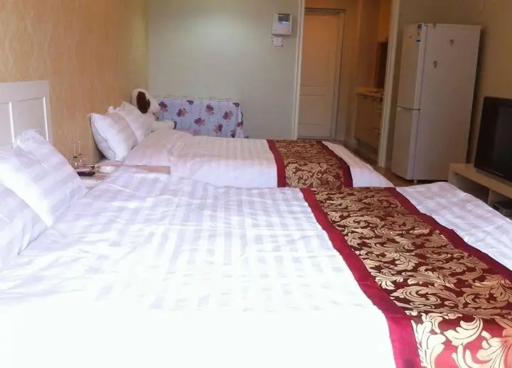 Далянь: Zuoan Yinghao Hotel Apartment