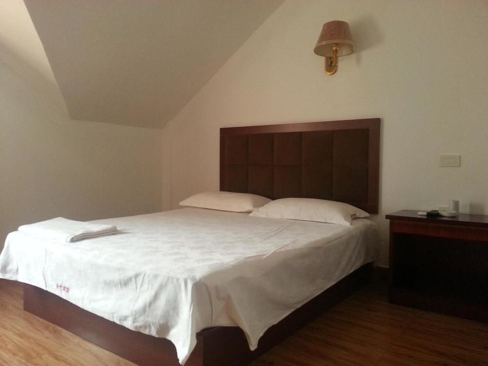 Ухань: Wuhan Tianlun Holiday Hotel (Panlongcheng Jiahai Industrial Park)