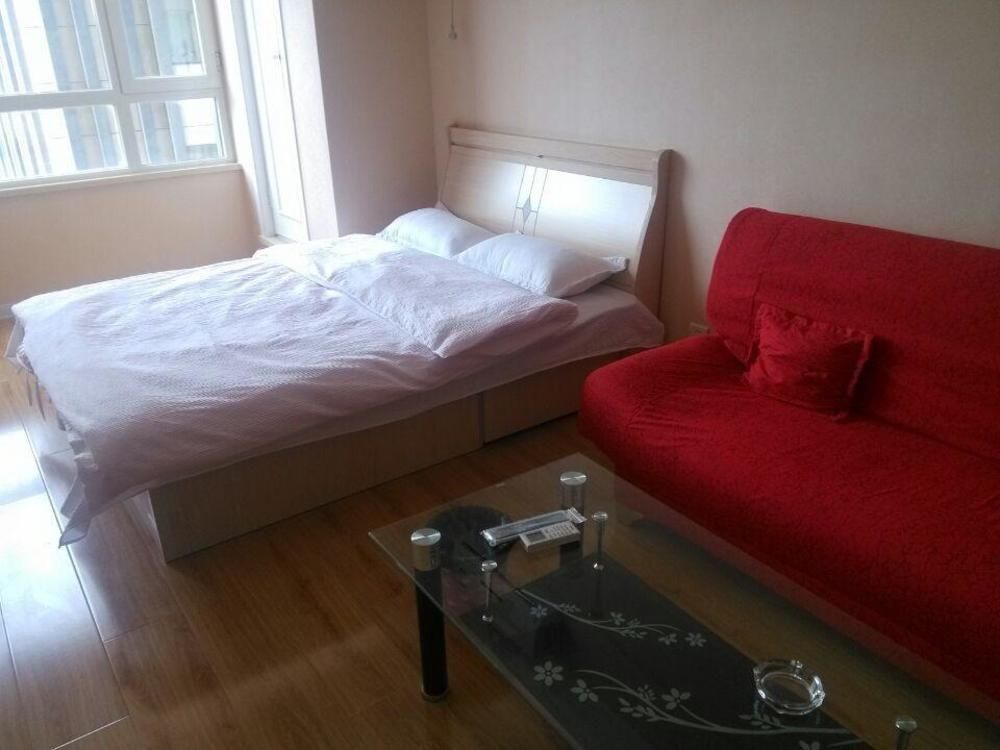 Далянь: Xinduhui Hotel Apartment