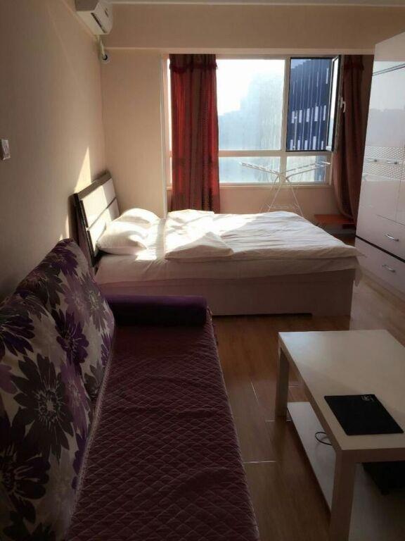 Далянь: Xinduhui Hotel Apartment