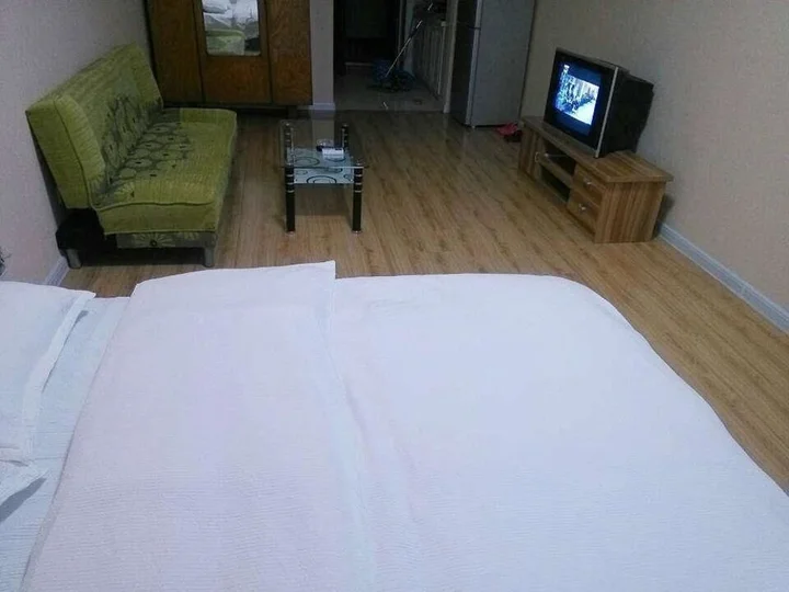 Далянь: Xinduhui Hotel Apartment