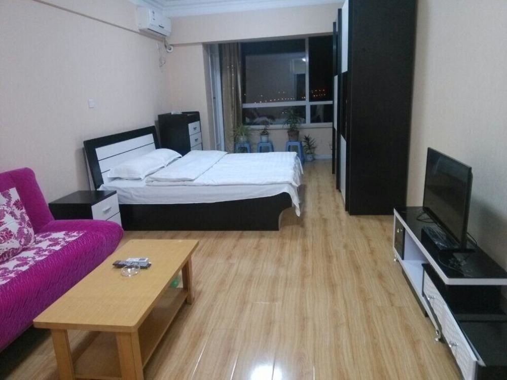 Далянь: Xinduhui Hotel Apartment