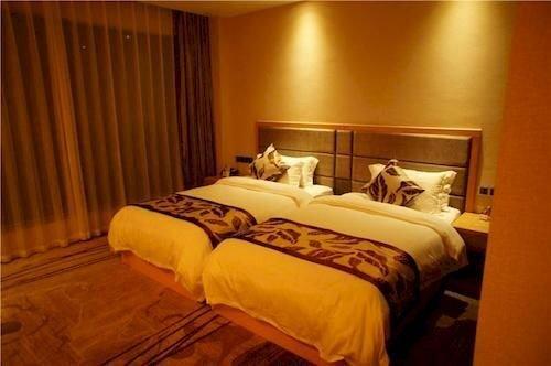 Шанграо: Peninsula International Hotel