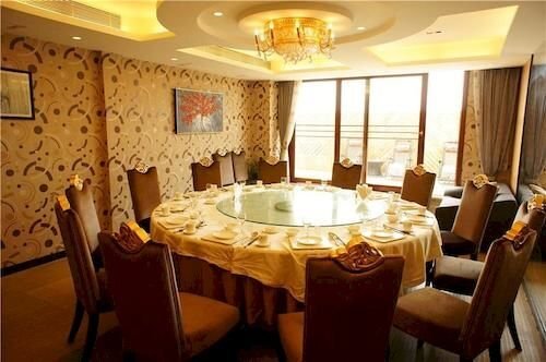 Шанграо: Peninsula International Hotel