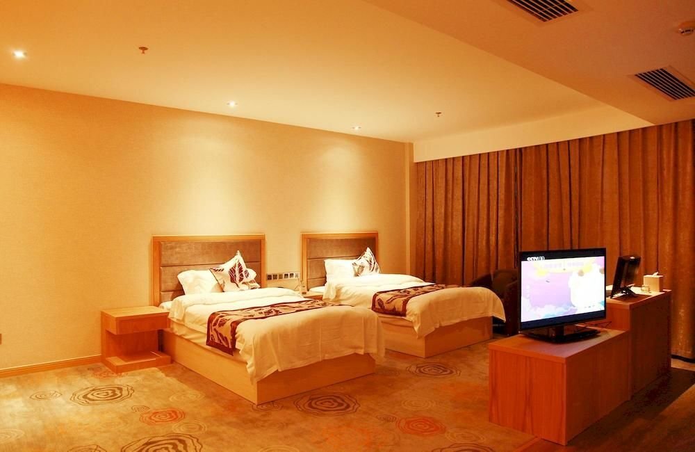 Шанграо: Peninsula International Hotel