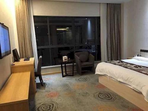 Шанграо: Peninsula International Hotel