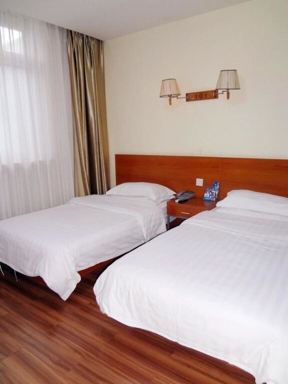 Таншань: Yijia Hotel