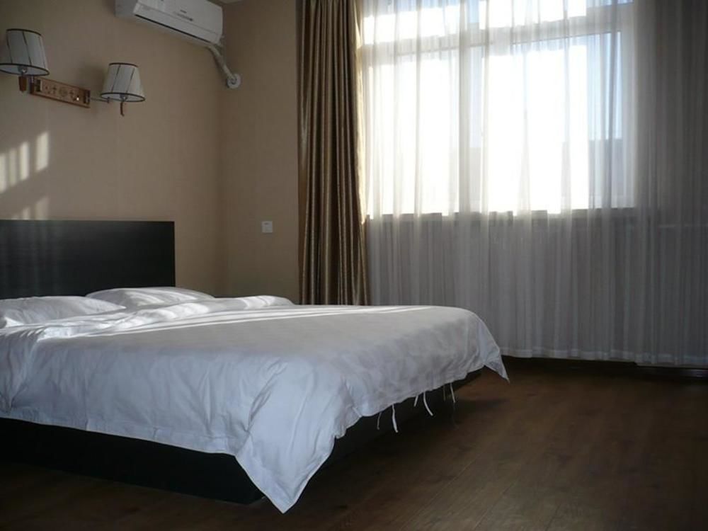 Таншань: Yijia Hotel