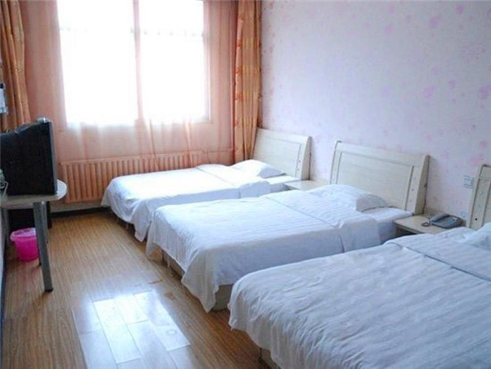 Таншань: Yijia Hotel