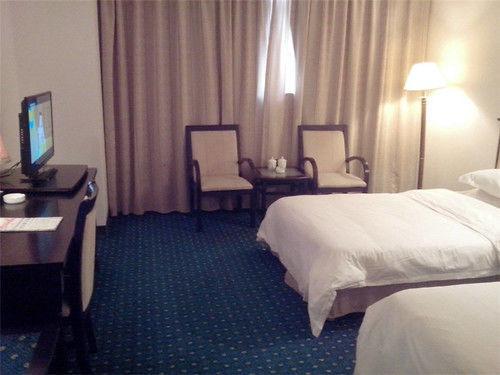 Синьян: Sunny Hotel - Xinyang