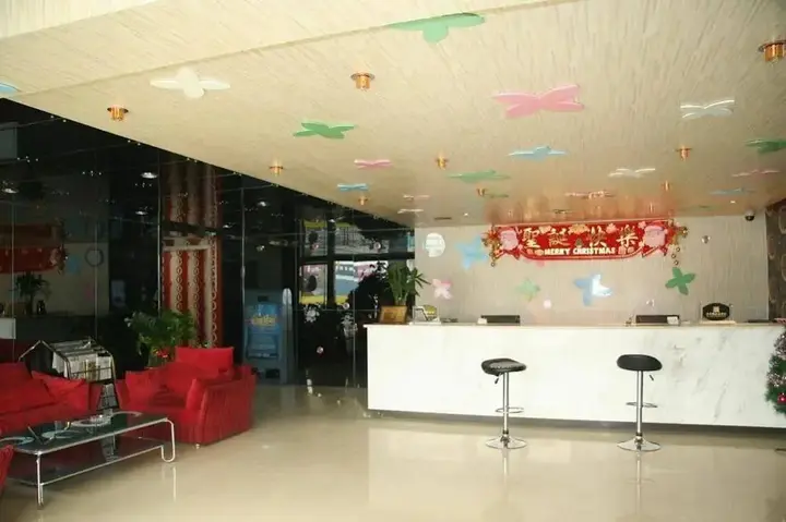 Чжэнчжоу: Zhengzhou Gaocheng Business Hotel