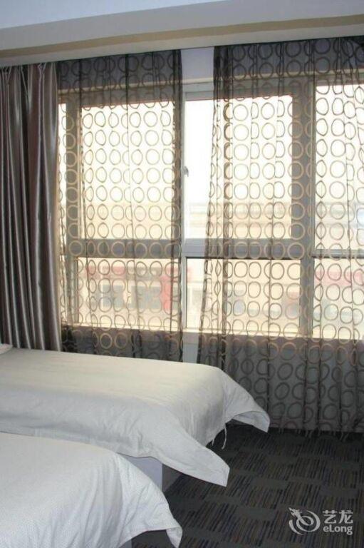 Чжэнчжоу: Zhengzhou Gaocheng Business Hotel