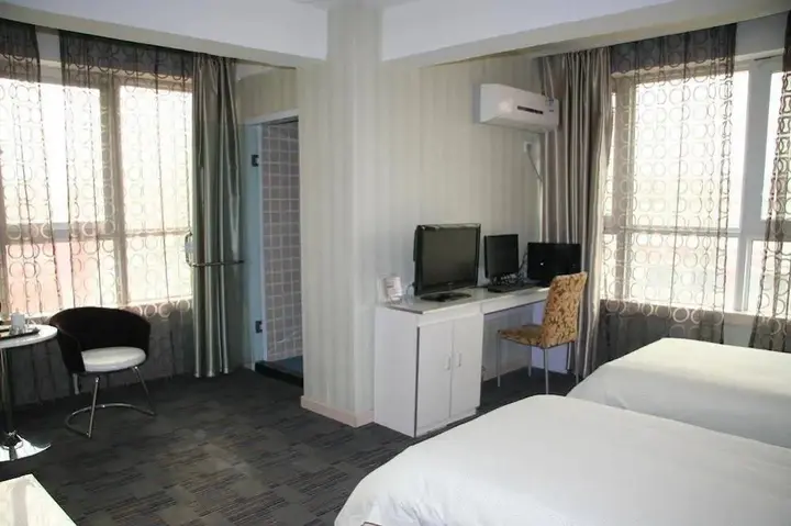 Чжэнчжоу: Zhengzhou Gaocheng Business Hotel