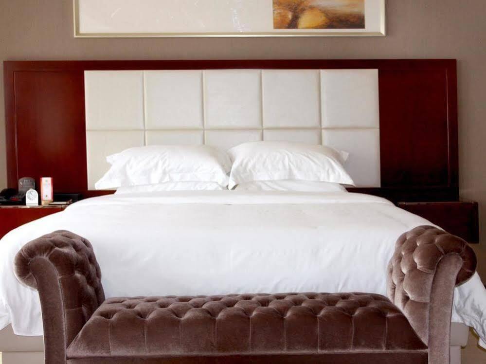 Таншань: Phoenix Business Hotel