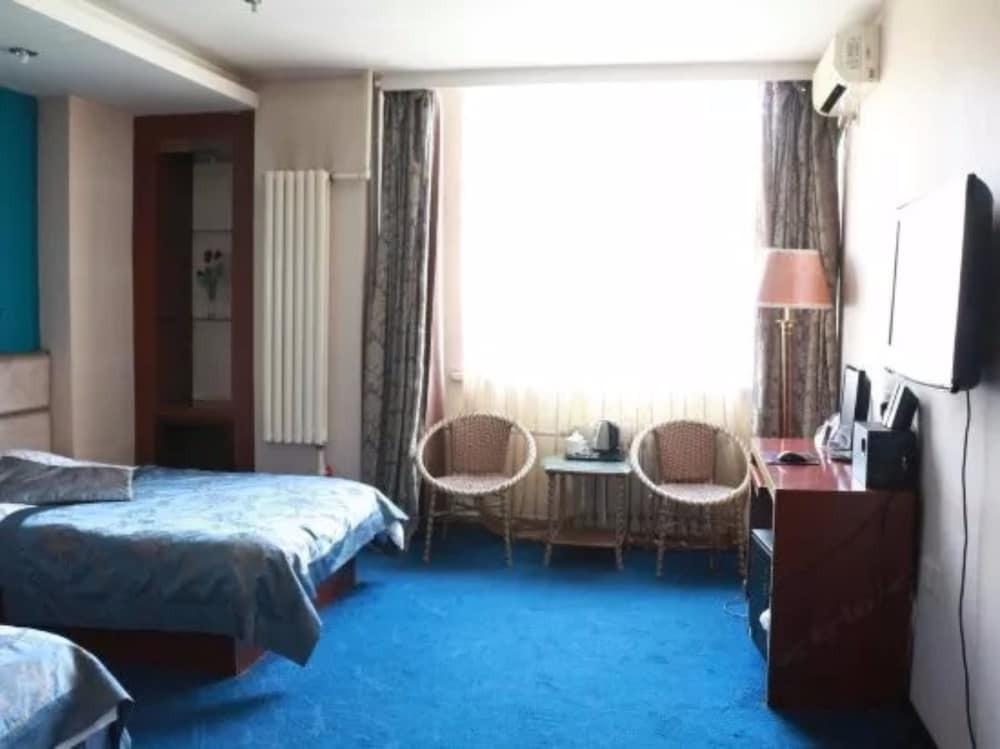 Харбин: BaiJiaCheng Business Hotel