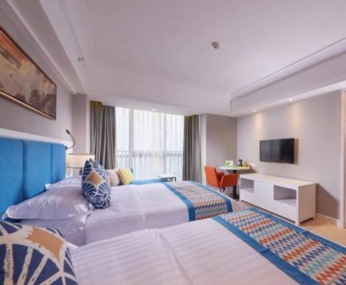Бэйхай: New Century Manju Hotel Beihai Yintan