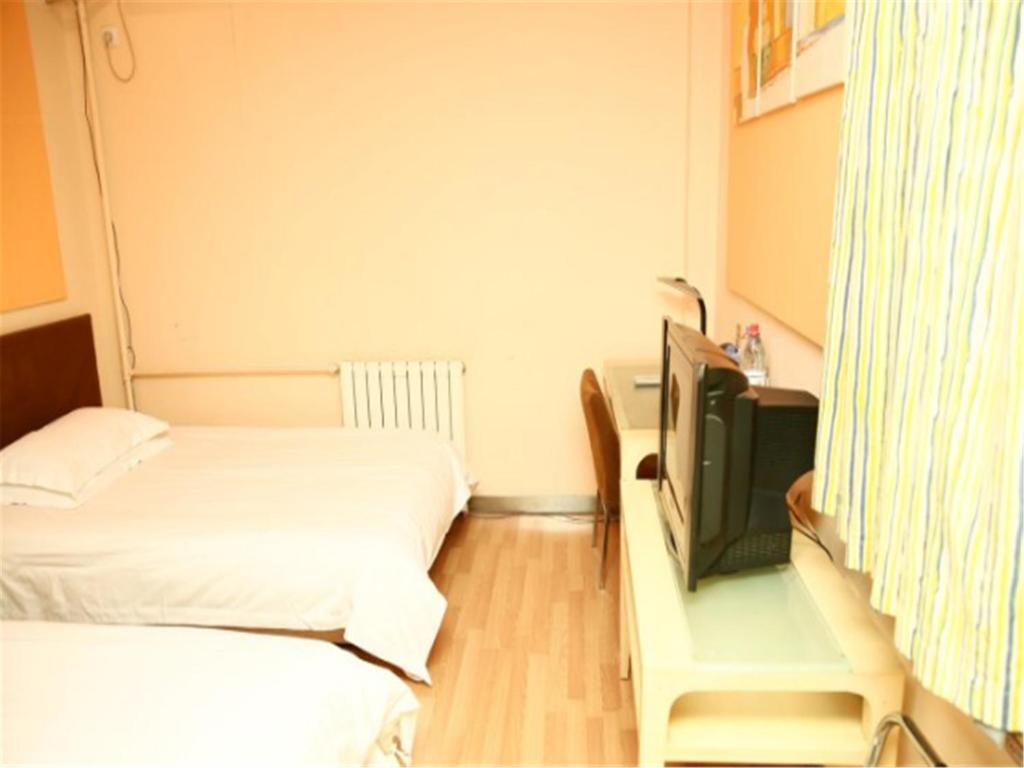 Цзинин: Grace Inn Jining Taibai Road