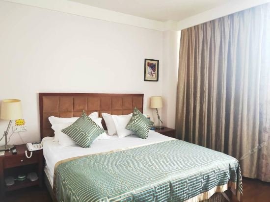 Лешан: Jinshang Business Hotel