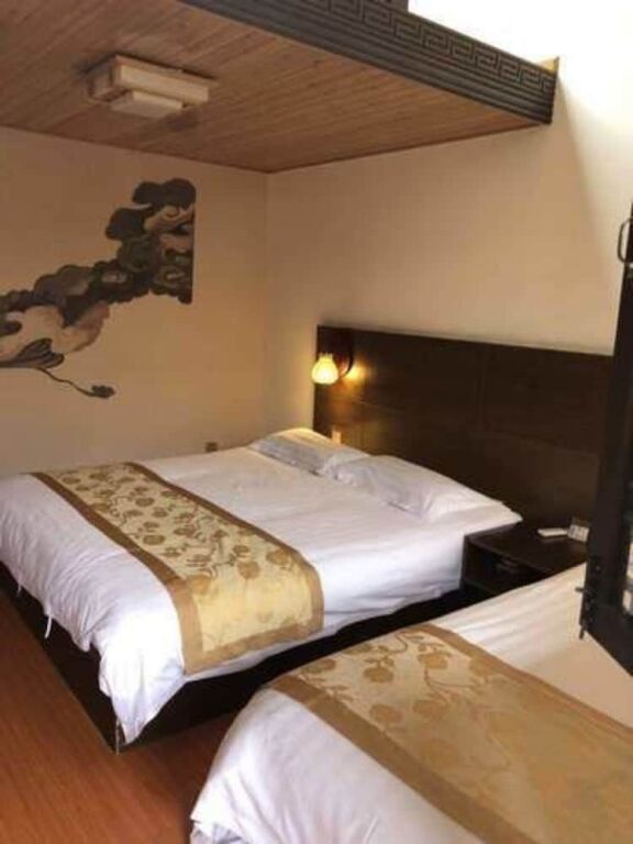 Дали: Taiheju Inn