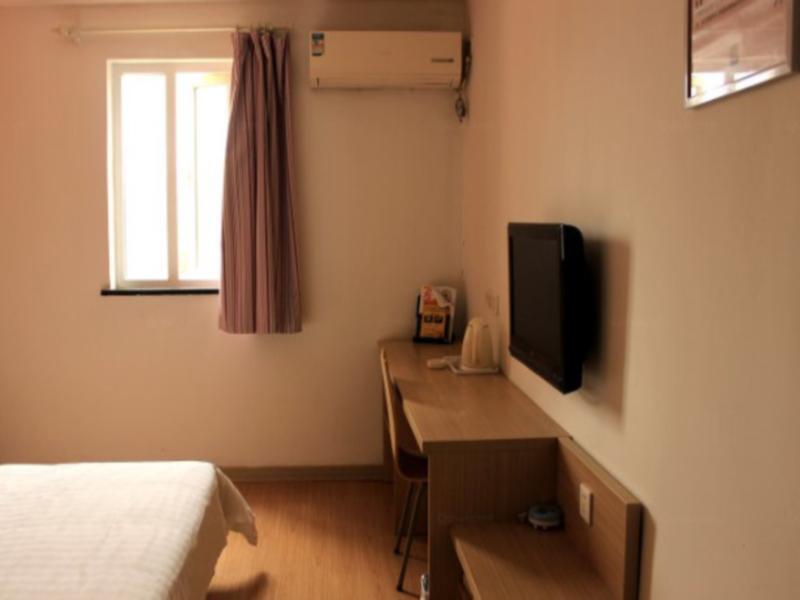 Чжэньцзян: 7 Days Inn Zhenjiang Xin Qu Da Gang