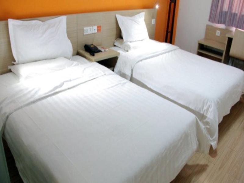 Чжэньцзян: 7 Days Inn Zhenjiang Xin Qu Da Gang