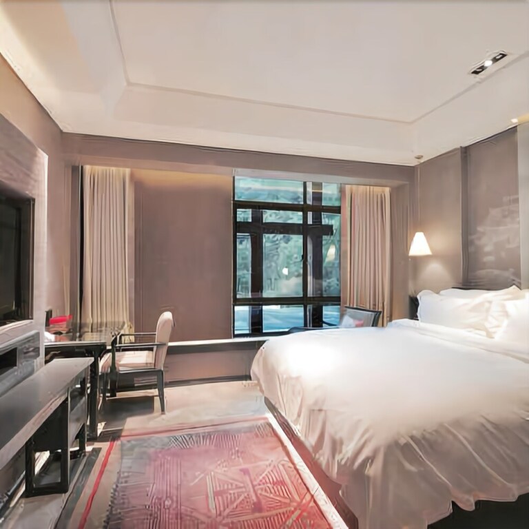 Дунъян: Homei Hotel
