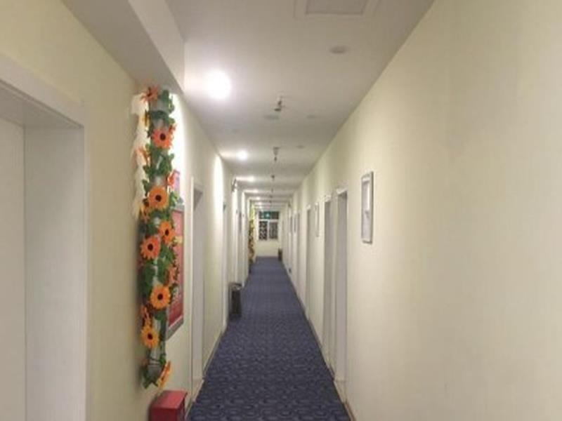 7 Days Inn Xinyang Minquan Road Minqiao Branch — фото 1