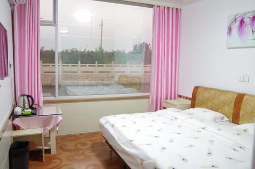 Жичжао: Hailuowan Hotel