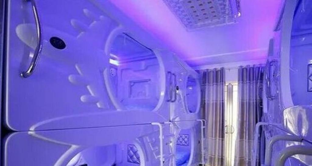Чанша: You Wo capsule Hostel