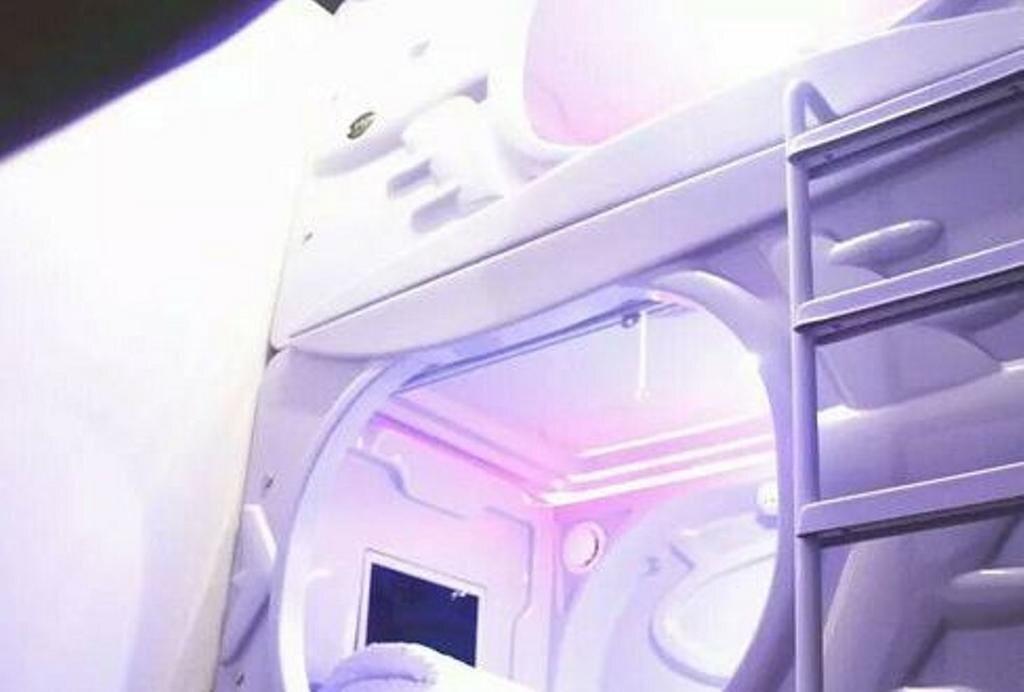 Чанша: You Wo capsule Hostel