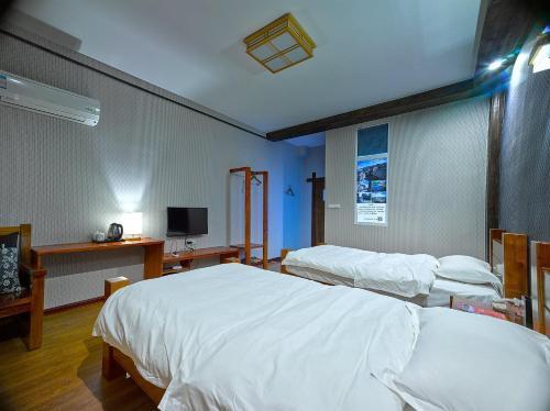 Баинченг: Xiushan Cha Dong Photography Hostel
