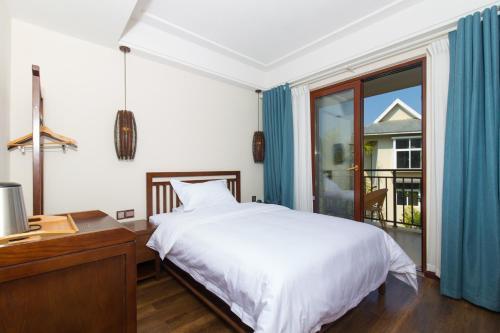 Цзинхун: Pu’er Tea Boutique Inn