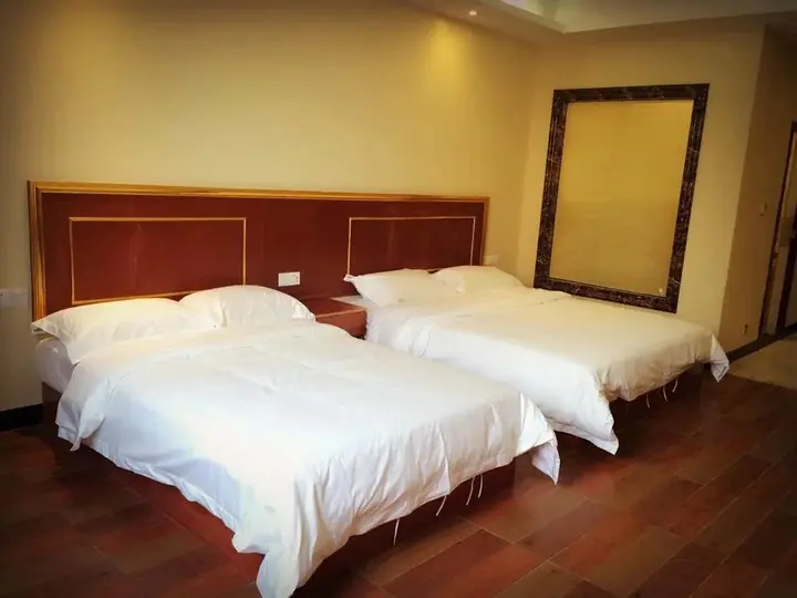 Шаогуань: Q+ Nanxiong Xinhewan Business Hotel