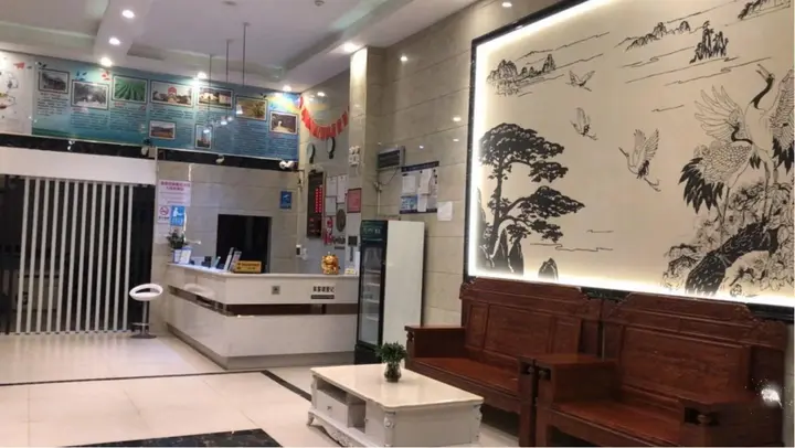 Шаогуань: Q+ Nanxiong Xinhewan Business Hotel