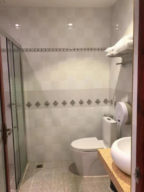 Шаогуань: Q+ Nanxiong Xinhewan Business Hotel