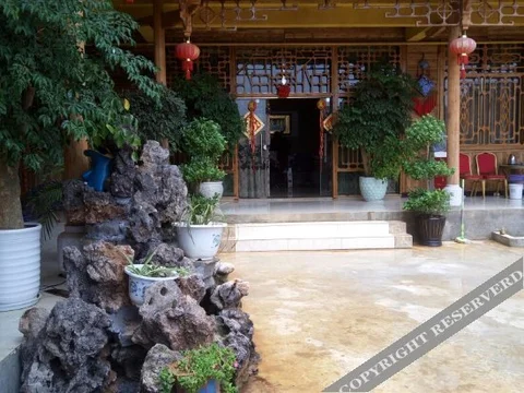 Пучжэхэй: Puzhehei Chengshi Nongyuan Hotel